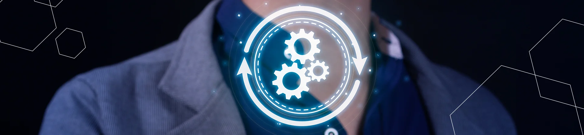 software updates and installation are represented in the foreground by a set of digital gears surrounded by cyclical arrows while a suited business person stands behind.